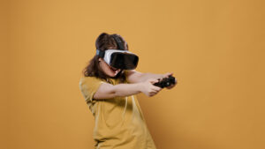 Türkiye oyunun kurallarını yeniden yazıyor 5 woman playing game using vr goggles console controller trying win difficult level studio gamer girl having intense experience with virtual reality looking 3d surrounding enviroment
